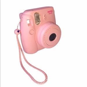 Fujifilm instax 8 polaroid camera in pink